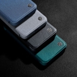 کیف چرمی پارچه ای نیلکین آیفون 15 پرو مکس مدل Qin Pro Plain Leather Cloth case
