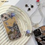 قاب دخترانه گوشی آیفون 15 پرو مکس مدل پروانه نقره ای همراه با آویز و محافظ لنز نگین دار